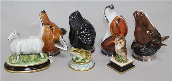 Three Michael Sutty animals, owl, frog and sheep and four Royal Stratford stirrup cups with plated mounts